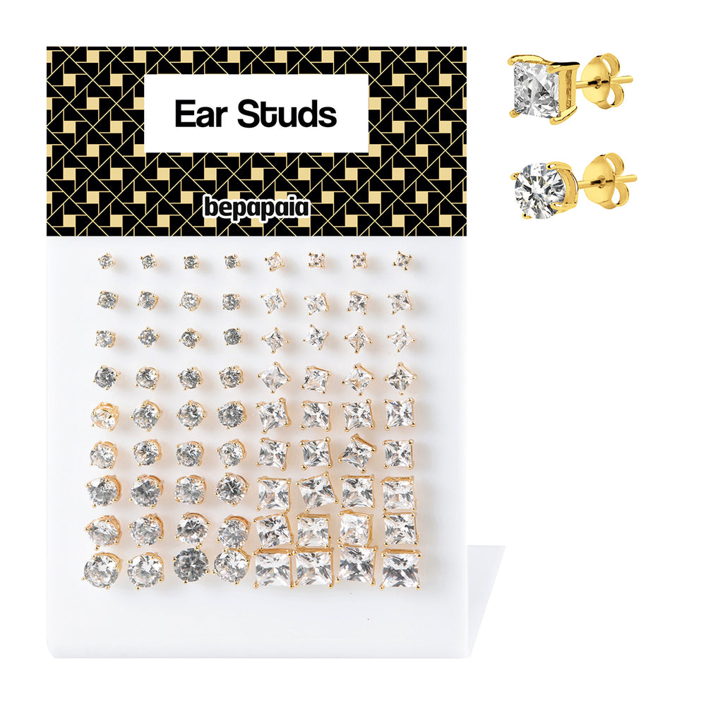 Puce d’oreille en acier doré avec zircone doublement sertie