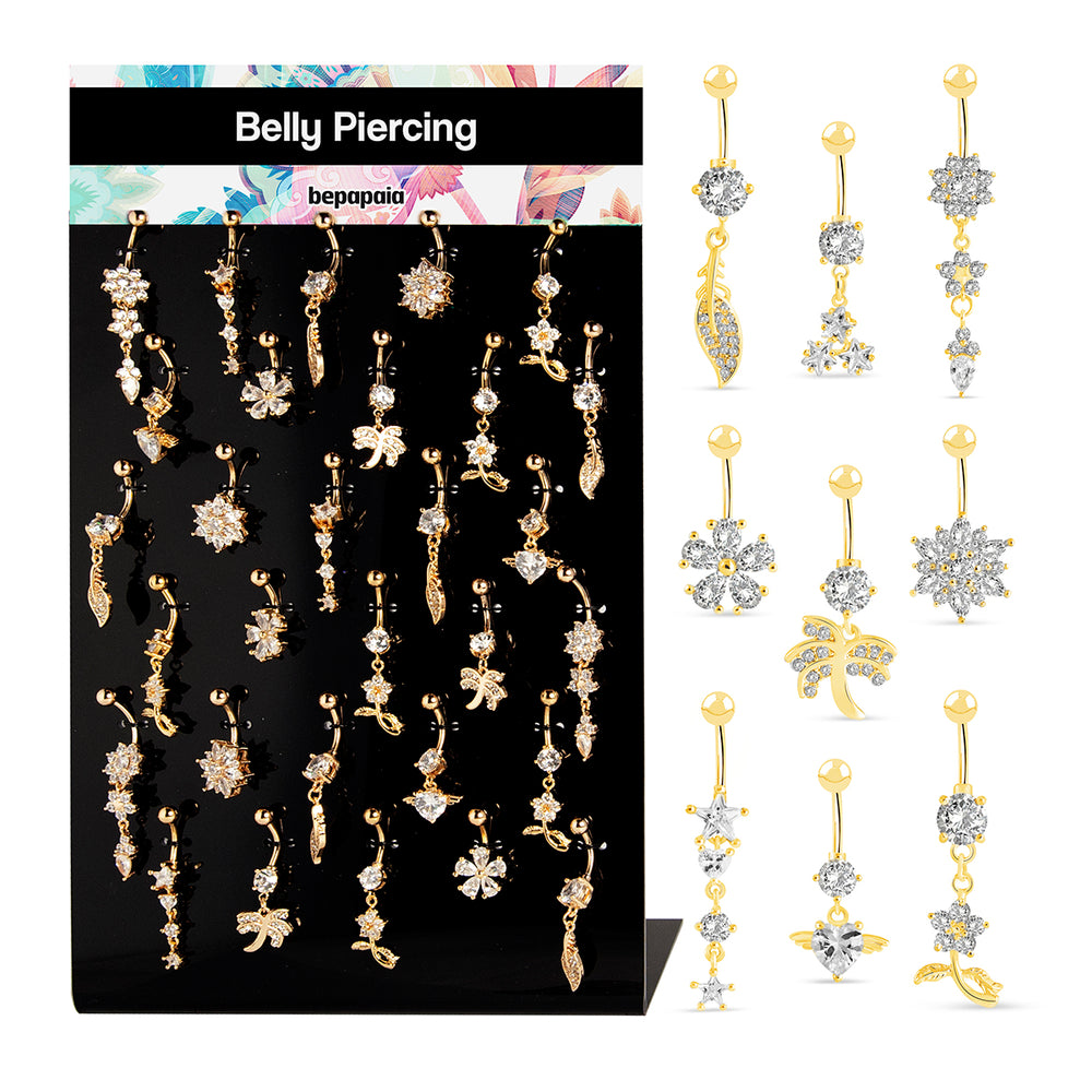 Piercing de nombril en acier doré avec plusieurs zircons