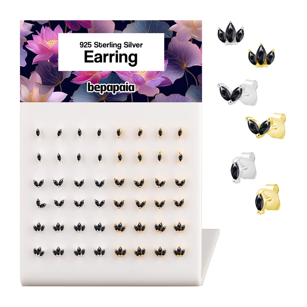 Boucle d’oreille en argent avec pétales et pierre noire